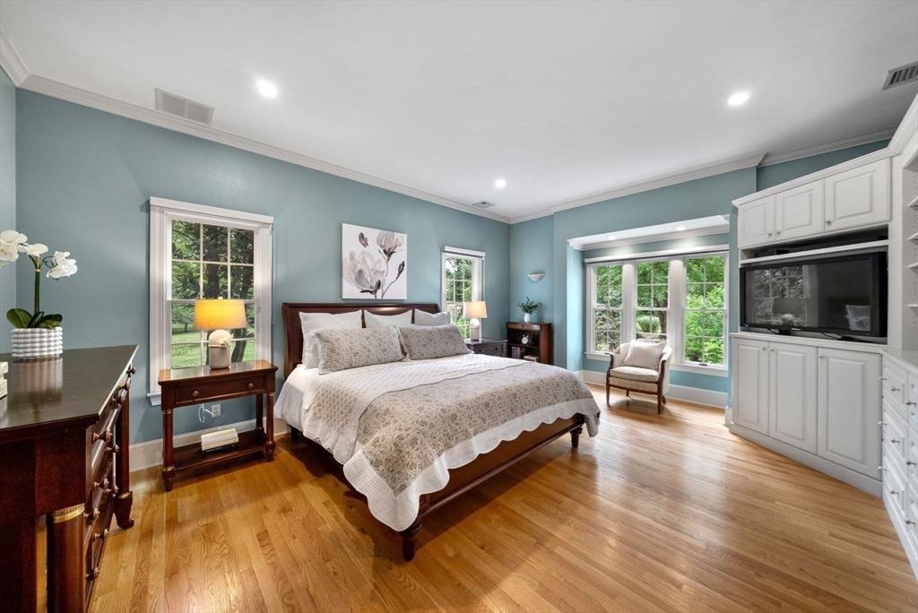 364 Hickory Road North Attleboro, MA 02760 - Photo 28 of 40 a spacious bedroom with a large bed and a flat tv screen