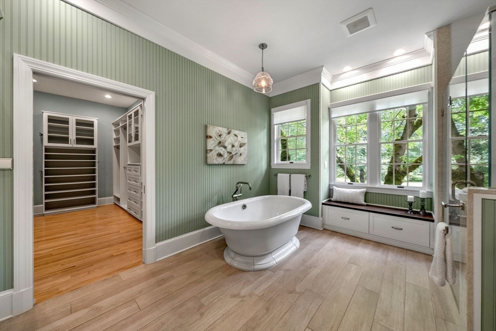 364 Hickory Road North Attleboro, MA 02760 - Photo 32 of 40 a spacious bathroom with a double vanity sink a mirror and a bathtub
