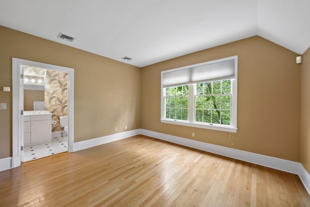 364 Hickory Road North Attleboro, MA 02760 - Photo 38 of 40 a view of an empty room with wooden floor and a window