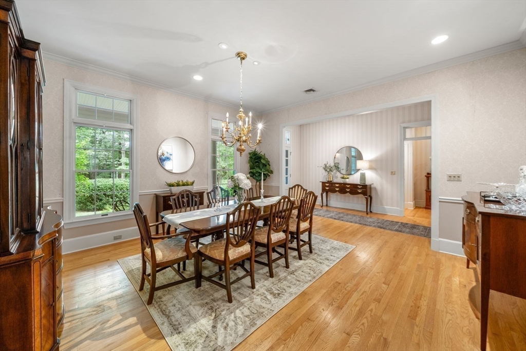 364 Hickory Road North Attleboro, MA 02760 - Photo 10 of 40 a view of a dining room with furniture and wooden floor