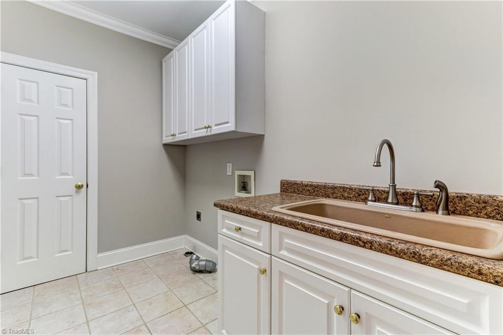 5803 Scarlett Court Oak Ridge, NC 27310 - Photo 21 of 30 Laundry Room