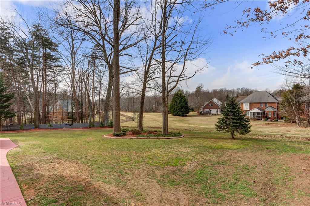 5803 Scarlett Court Oak Ridge, NC 27310 - Photo 29 of 30 Back Yard