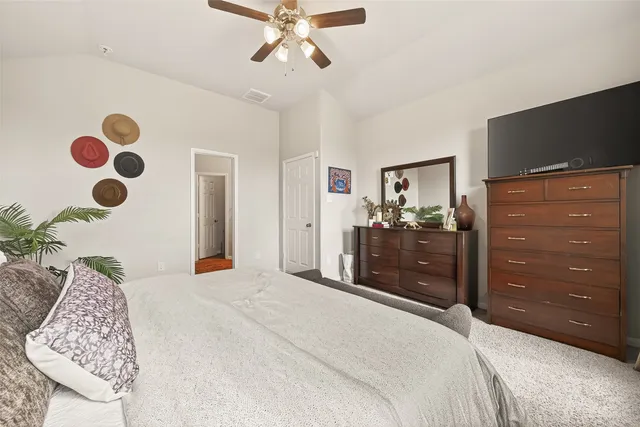 a bathroom with a shower and a sink