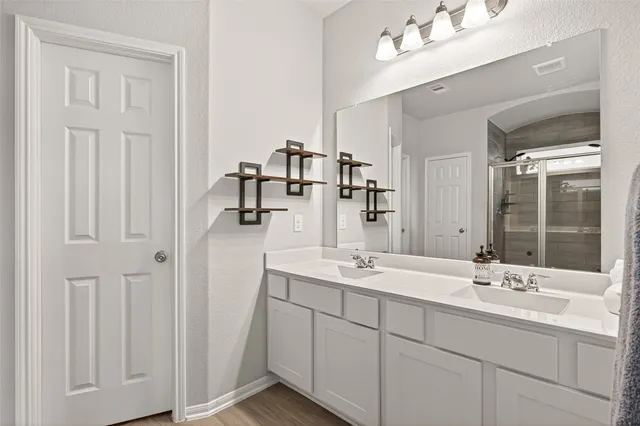 a living room with furniture gym equipment and a window