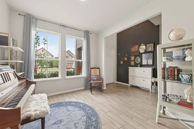 a view of a dining room with furniture window and outside view