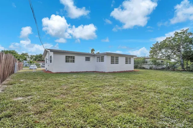 a view of a backyard with a garden