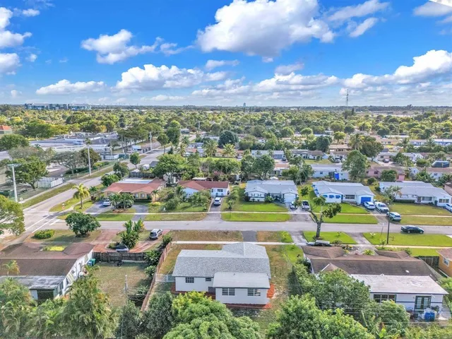an aerial view of residential building with outdoor space