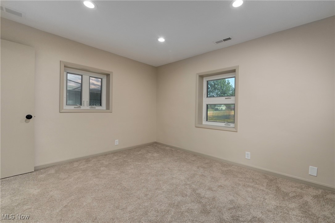 433 Chestnut Road Independence, OH 44131 - Photo 30 of 50 Carpeted empty room featuring recessed lighting and baseboards