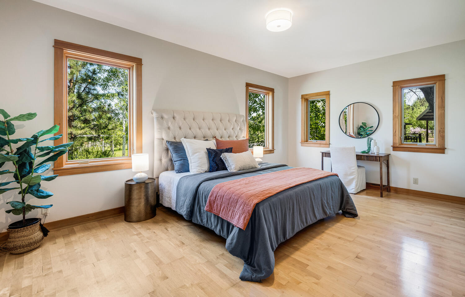 19007 Innes Market Road Bend, OR 97703 - Photo 17 of 39 a spacious bedroom with a large bed and a large window