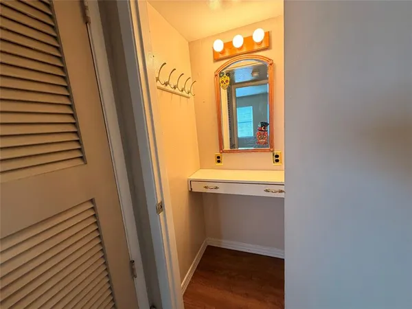 a bathroom with a sink and mirror
