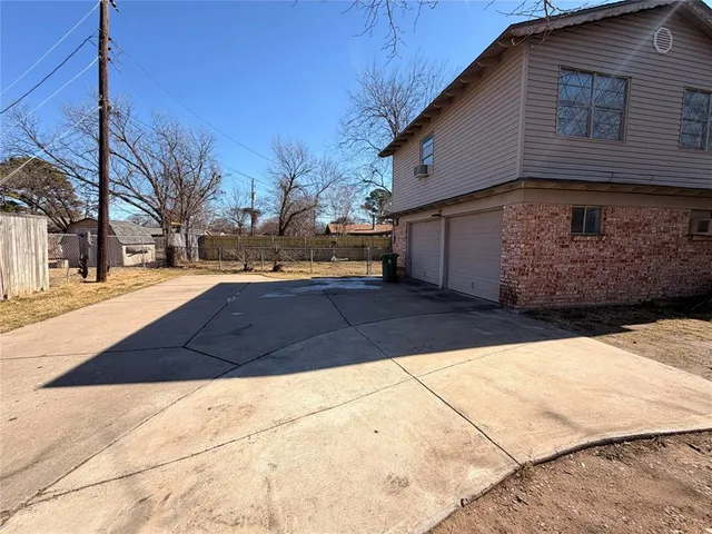 a view of backyard of house