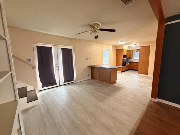 a view of a livingroom with a staircase
