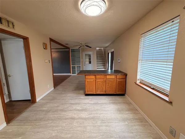 a room with a couch and a window