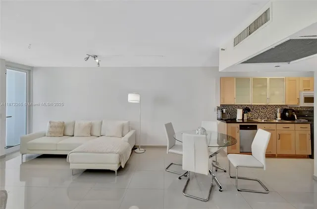 a kitchen with a sink and a window