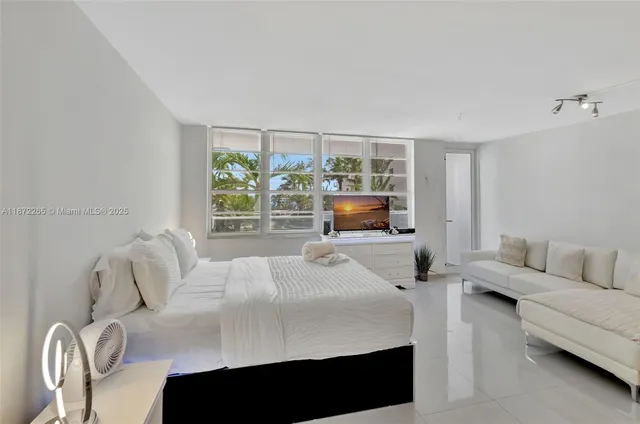 a kitchen with refrigerator and stove