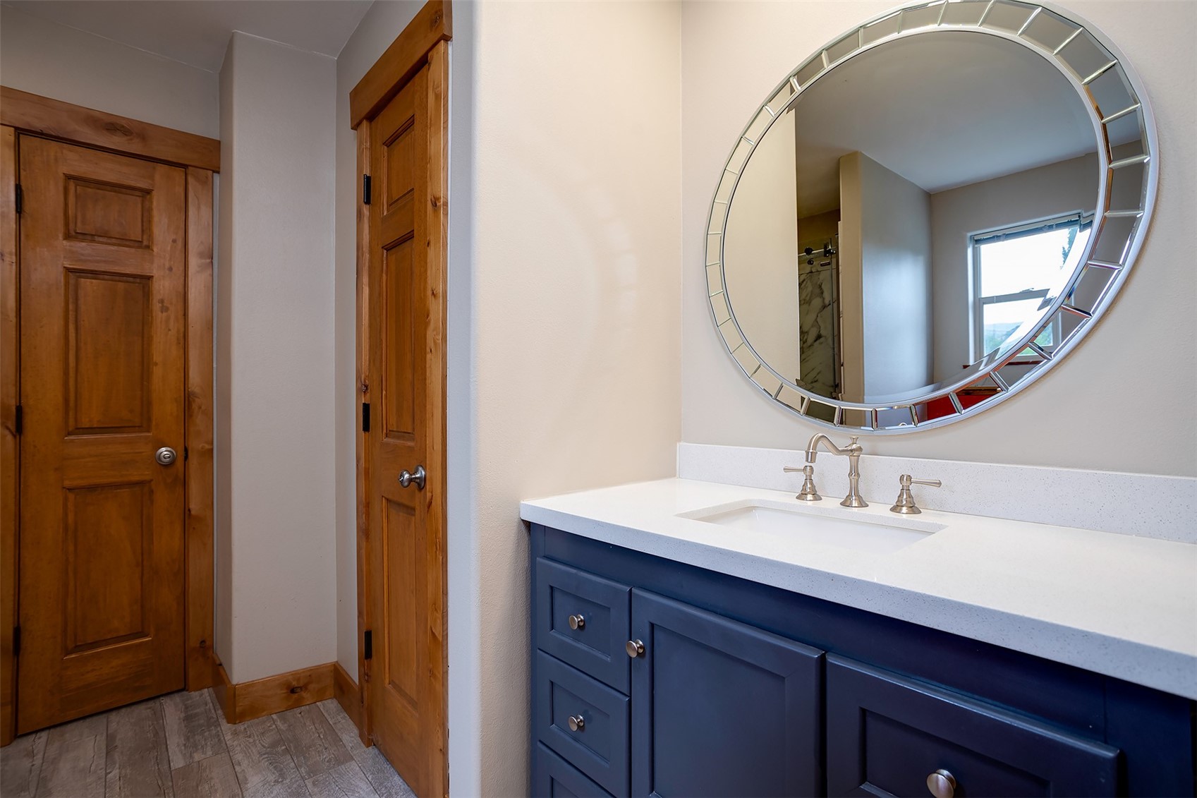 1170 Fish Creek Falls Road Steamboat Springs, CO 80487 - Photo 16 of 24 a bathroom with a sink and a mirror