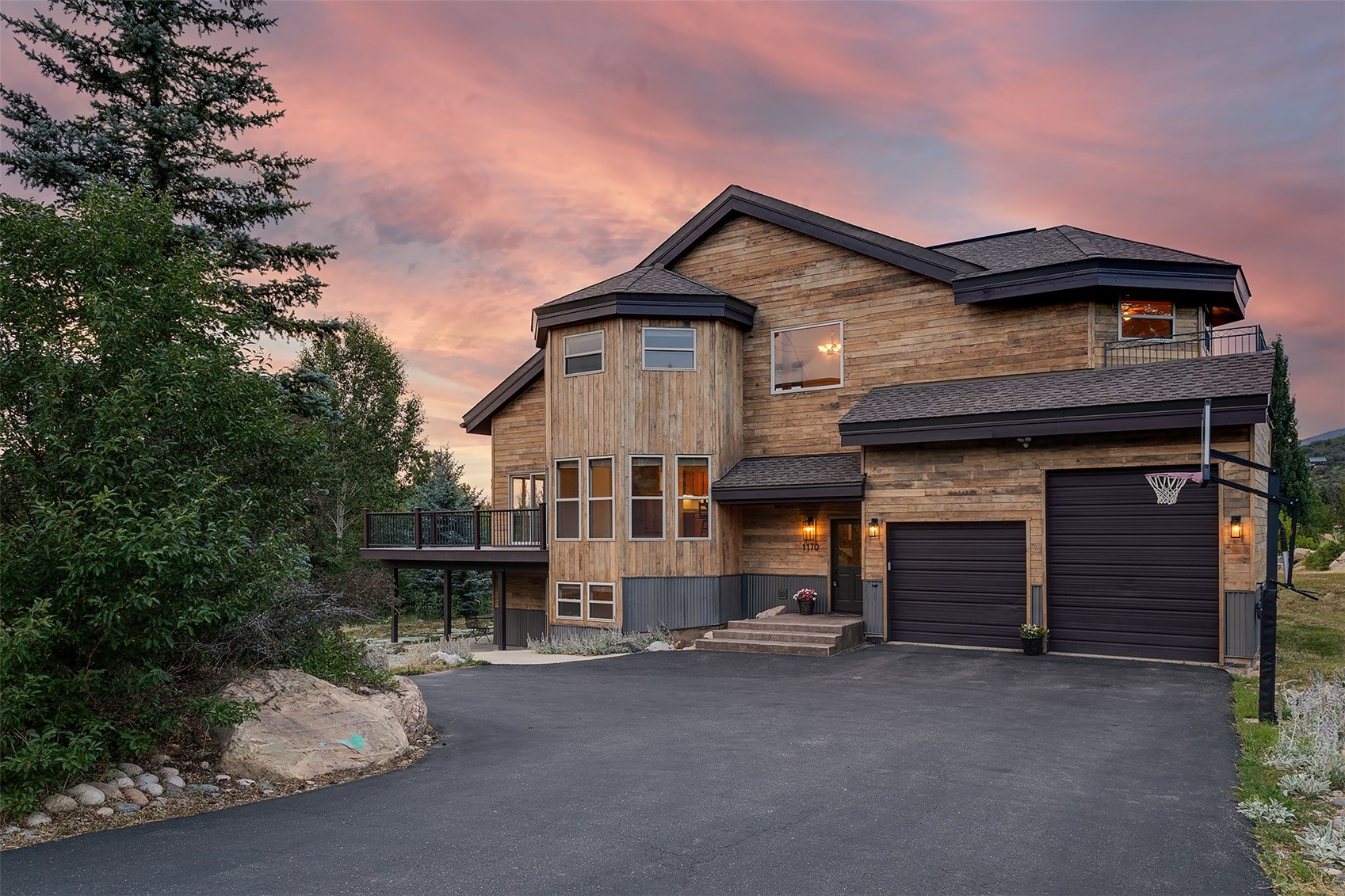 1170 Fish Creek Falls Road Steamboat Springs, CO 80487 - Photo 22 of 24 a view of a house with a street