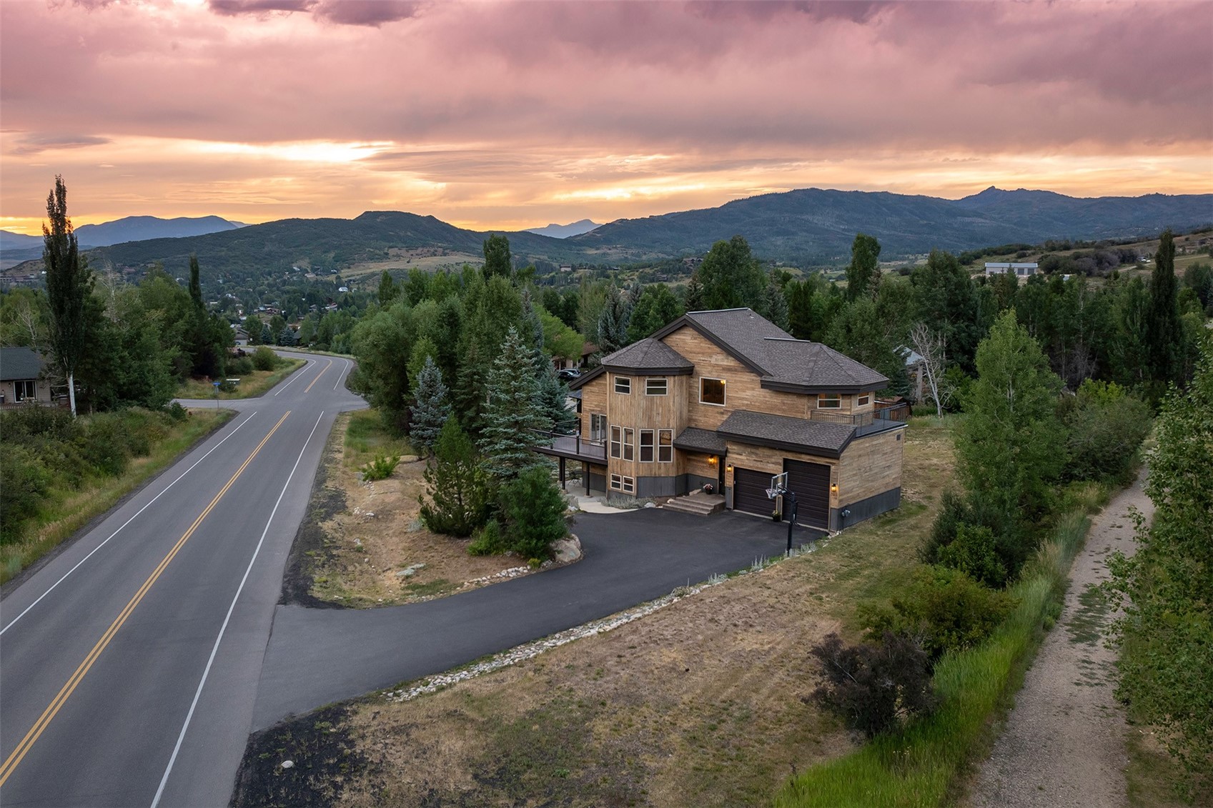1170 Fish Creek Falls Road Steamboat Springs, CO 80487 - Photo 23 of 24 a view of house with mountain view in front of it