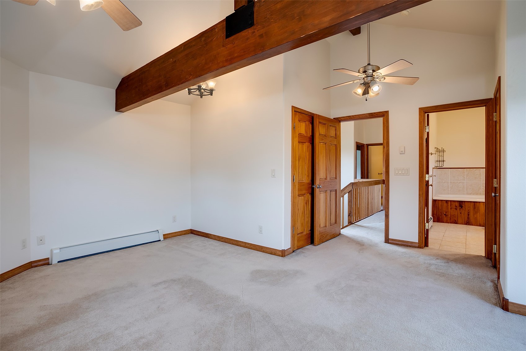 1170 Fish Creek Falls Road Steamboat Springs, CO 80487 - Photo 9 of 24 an empty room with chandelier fan