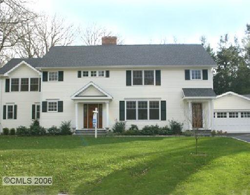 96 Summit Ridge Road Stamford, CT 06902 - Photo 1 of 1 a front view of a house with a garden