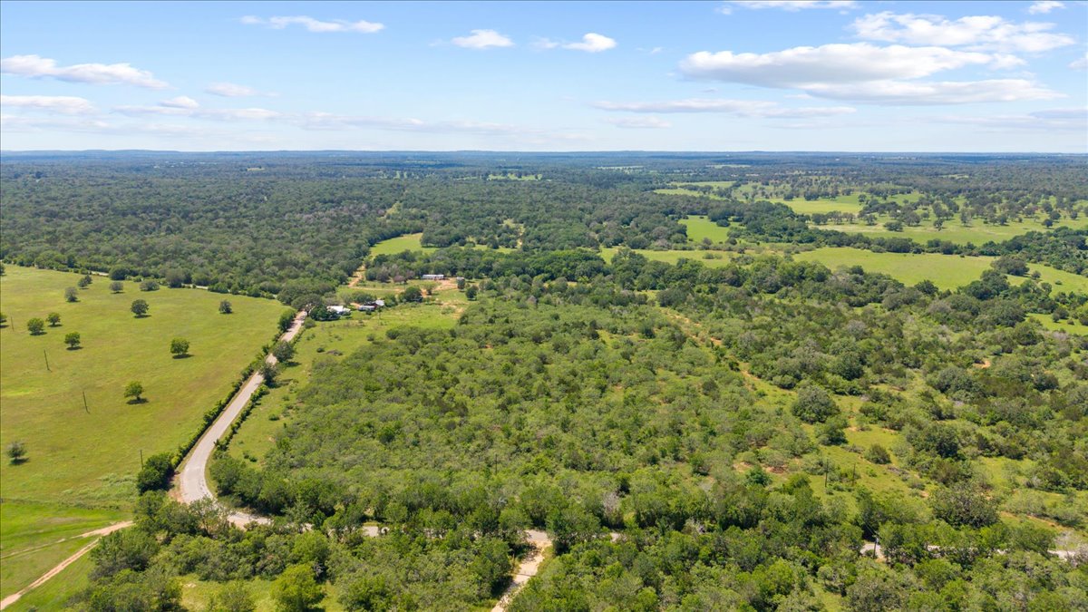 1648 Jeddo Road Rosanky, TX 78953 - Photo 8 of 19 an aerial view of residential houses with outdoor space