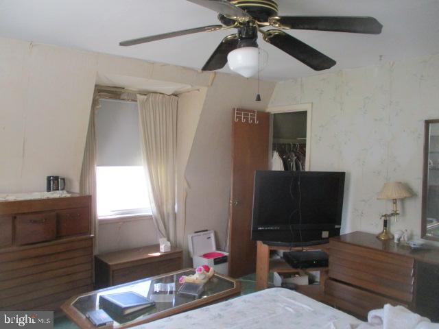 9612 Convent Avenue Philadelphia, PA 19114 - Photo 14 of 33 a living room with furniture and a flat screen tv
