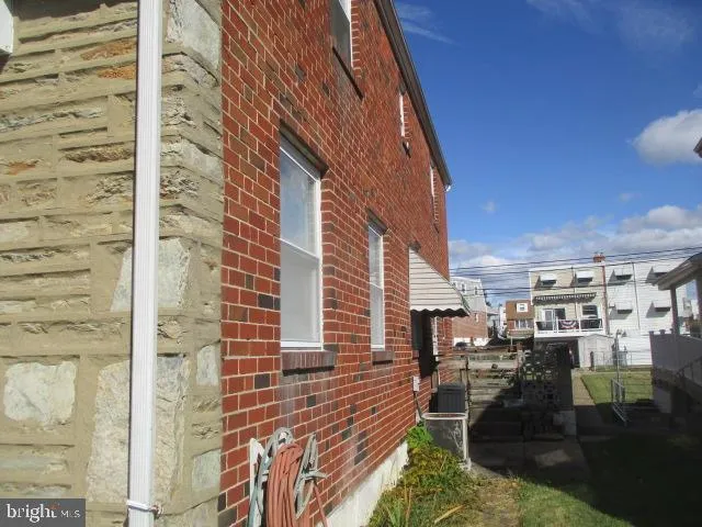 a view of pool with outdoor seating