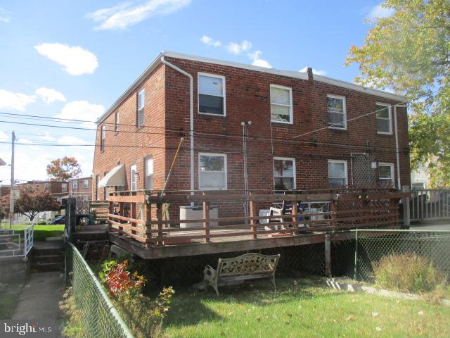 9612 Convent Avenue Philadelphia, PA 19114 - Photo 29 of 33 a large body of water next to a building with large trees