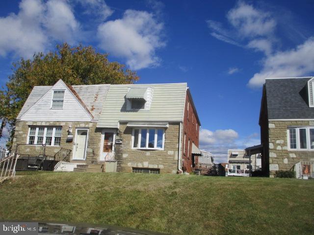 9612 Convent Avenue Philadelphia, PA 19114 - Photo 33 of 33 a view of a house with a yard