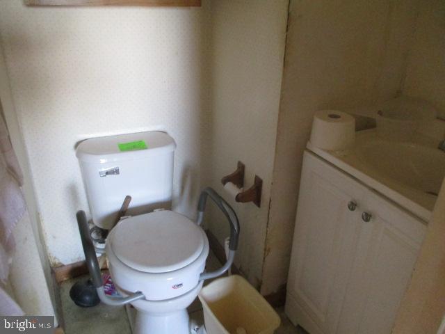 9612 Convent Avenue Philadelphia, PA 19114 - Photo 8 of 33 a white toilet sitting next to a sink