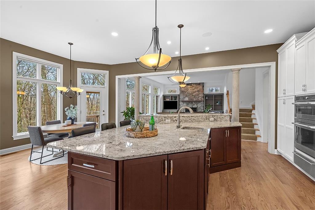 198 Camp Meeting Rd Extension Sewickley, PA 15143 - Photo 16 of 50 a kitchen with a stove and a wooden cabinets