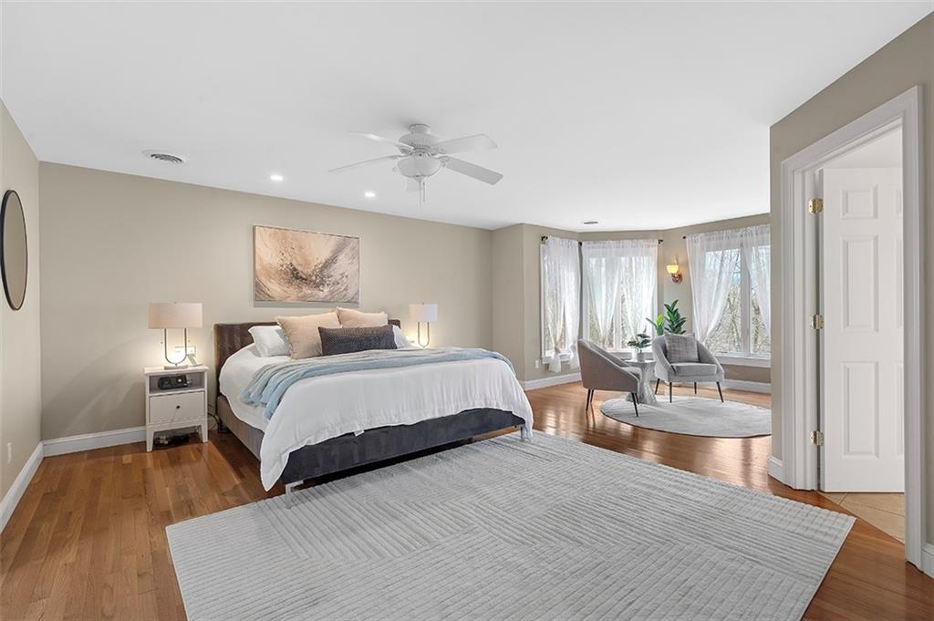 198 Camp Meeting Rd Extension Sewickley, PA 15143 - Photo 18 of 50 a bedroom with a bed and wooden floor