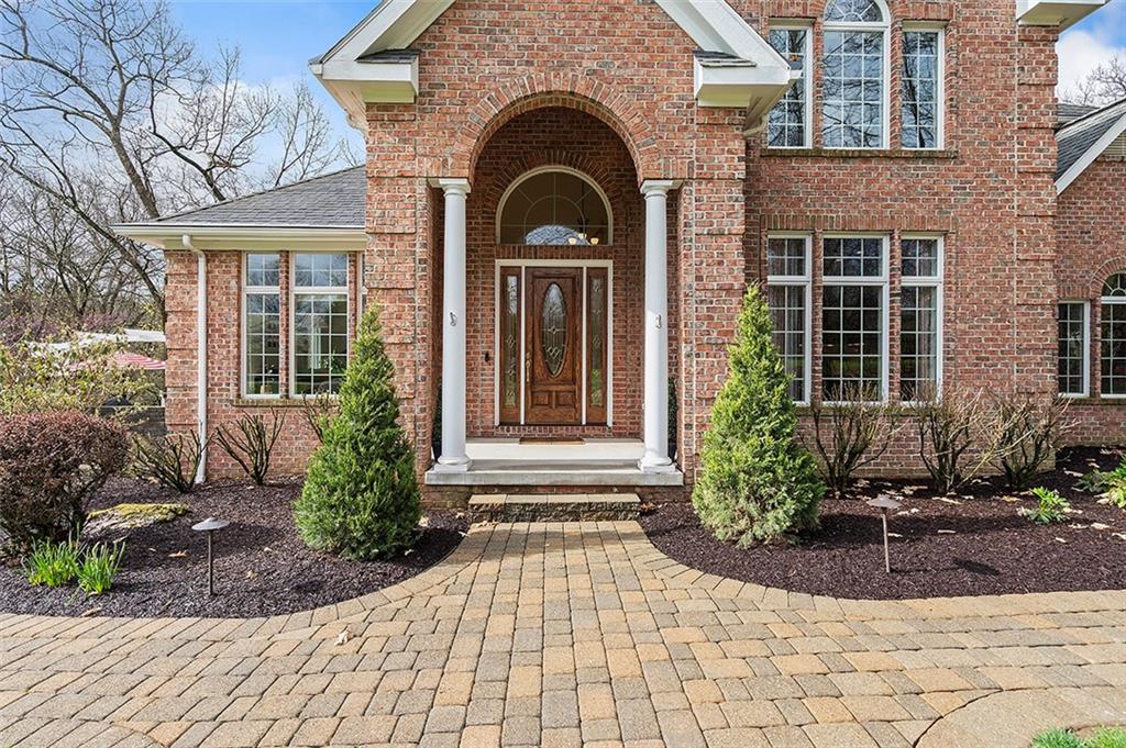 198 Camp Meeting Rd Extension Sewickley, PA 15143 - Photo 2 of 50 a front view of a house with garden