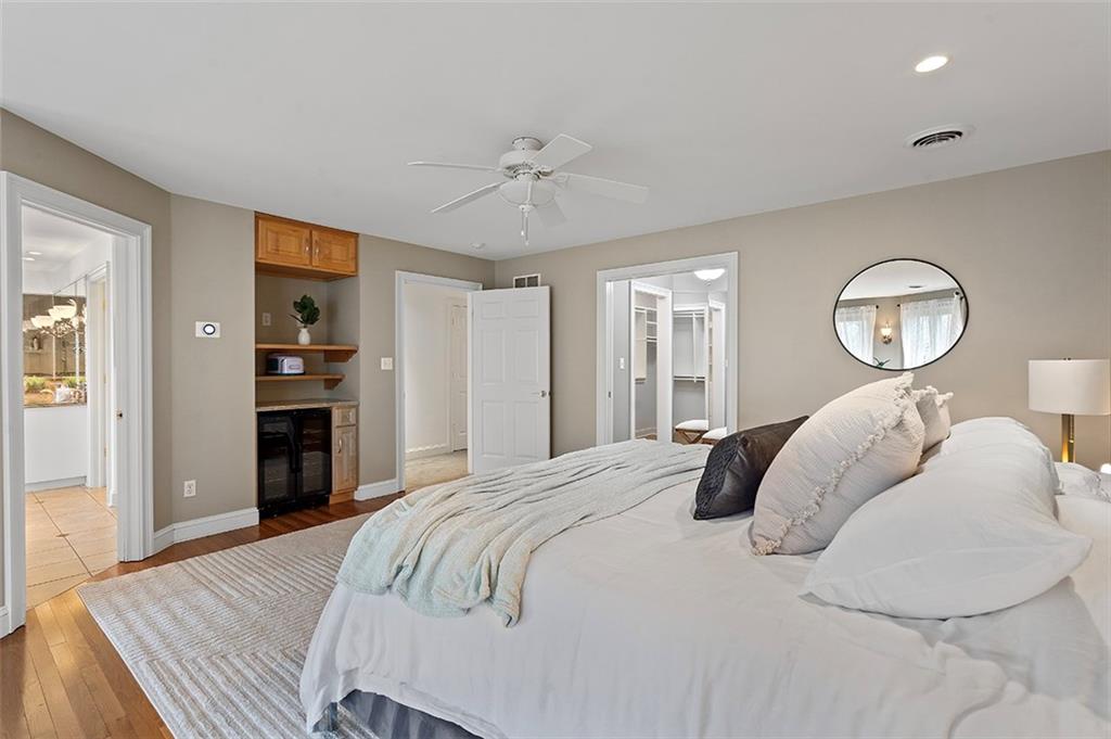 198 Camp Meeting Rd Extension Sewickley, PA 15143 - Photo 21 of 50 a bedroom with a large bed and a chandelier