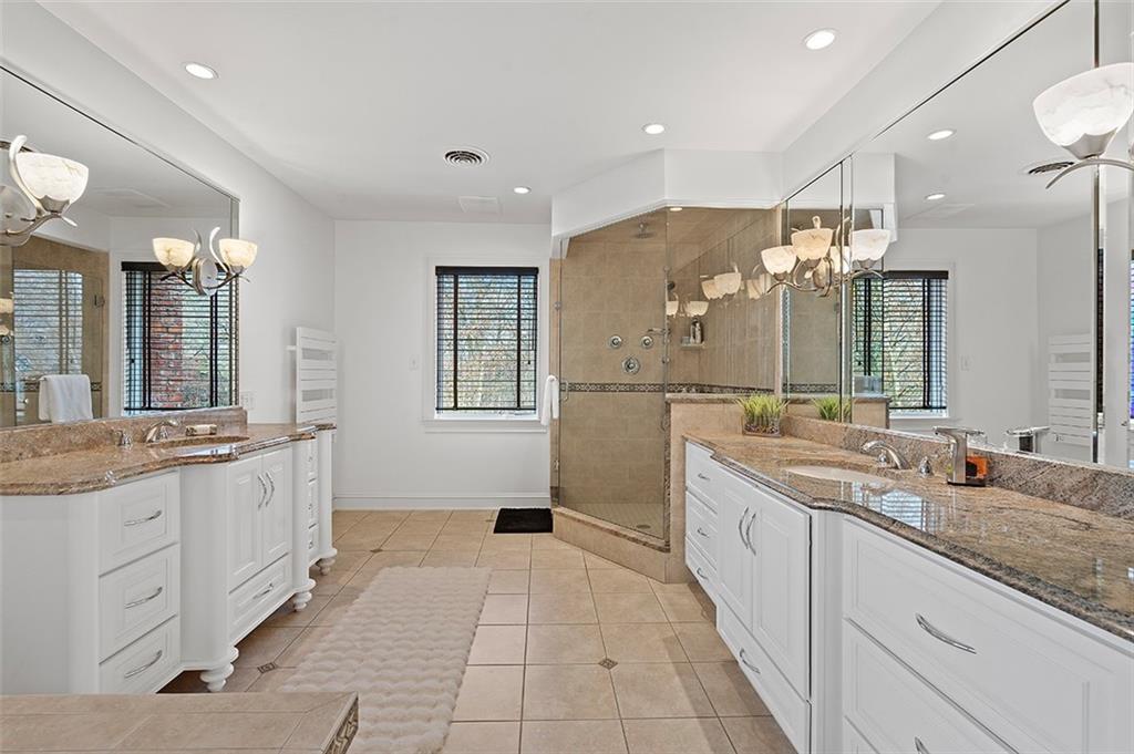 198 Camp Meeting Rd Extension Sewickley, PA 15143 - Photo 24 of 50 a spacious bathroom with a granite countertop double vanity sink a mirror and a shower
