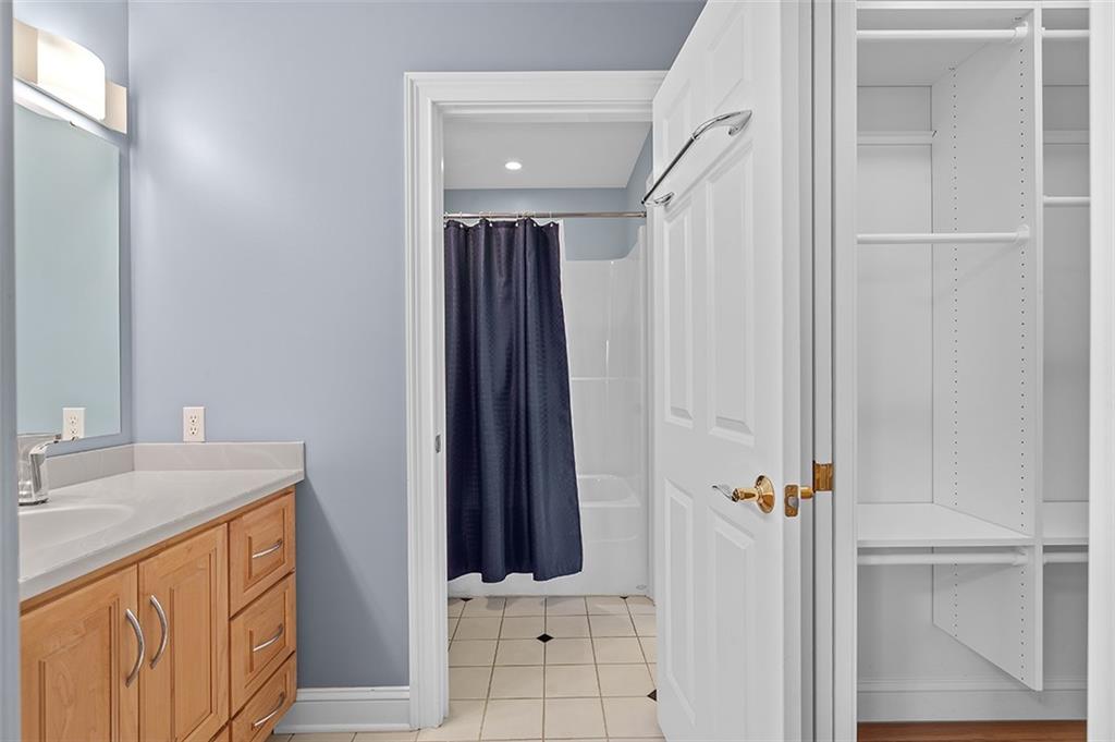 198 Camp Meeting Rd Extension Sewickley, PA 15143 - Photo 26 of 50 a bathroom with a granite countertop sink and a mirror