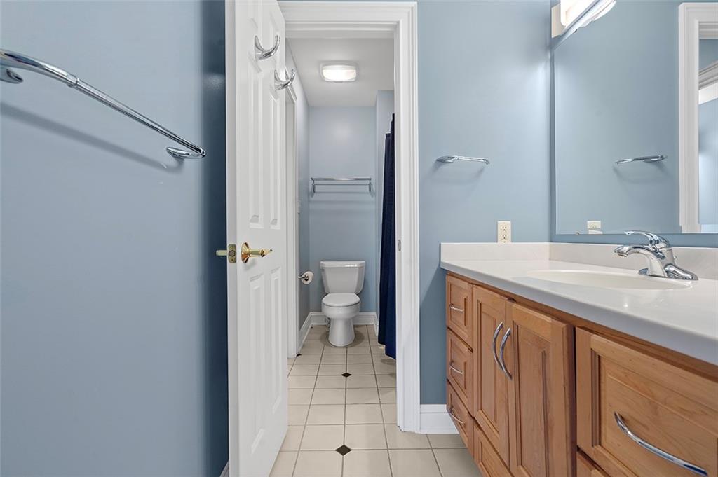 198 Camp Meeting Rd Extension Sewickley, PA 15143 - Photo 29 of 50 a bathroom with a sink a toilet and shower