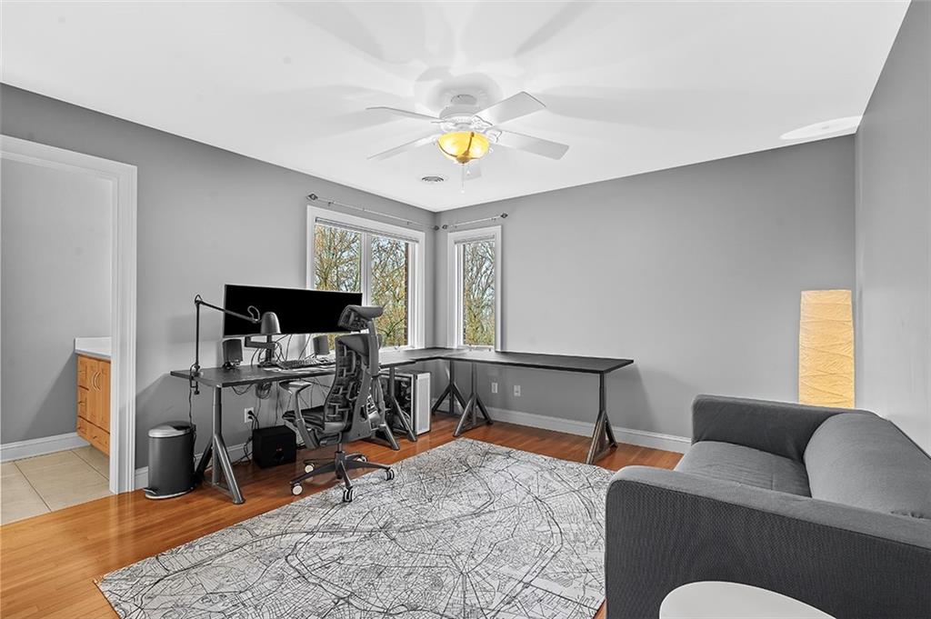198 Camp Meeting Rd Extension Sewickley, PA 15143 - Photo 30 of 50 a living room with furniture a rug and a flat screen tv