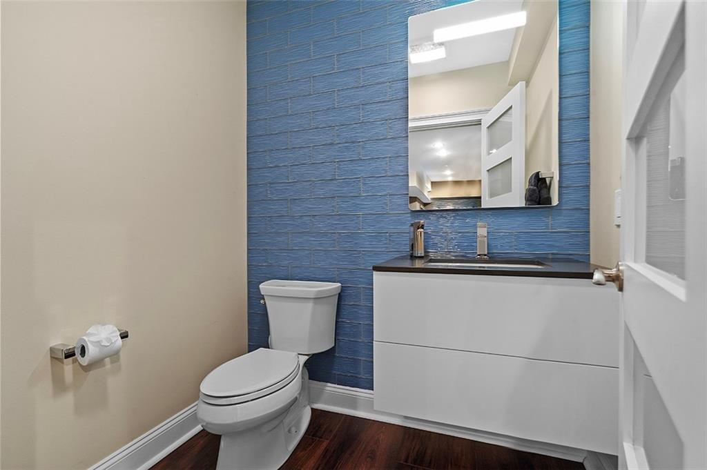 198 Camp Meeting Rd Extension Sewickley, PA 15143 - Photo 39 of 50 a bathroom with a granite countertop toilet and a sink