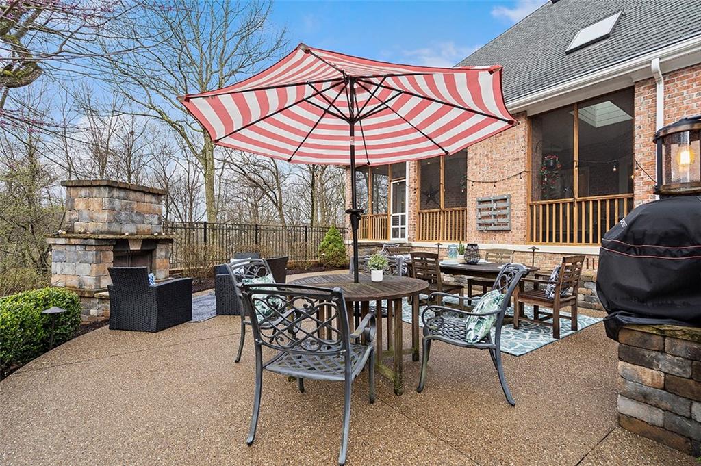 198 Camp Meeting Rd Extension Sewickley, PA 15143 - Photo 41 of 50 a patio with a table and chairs