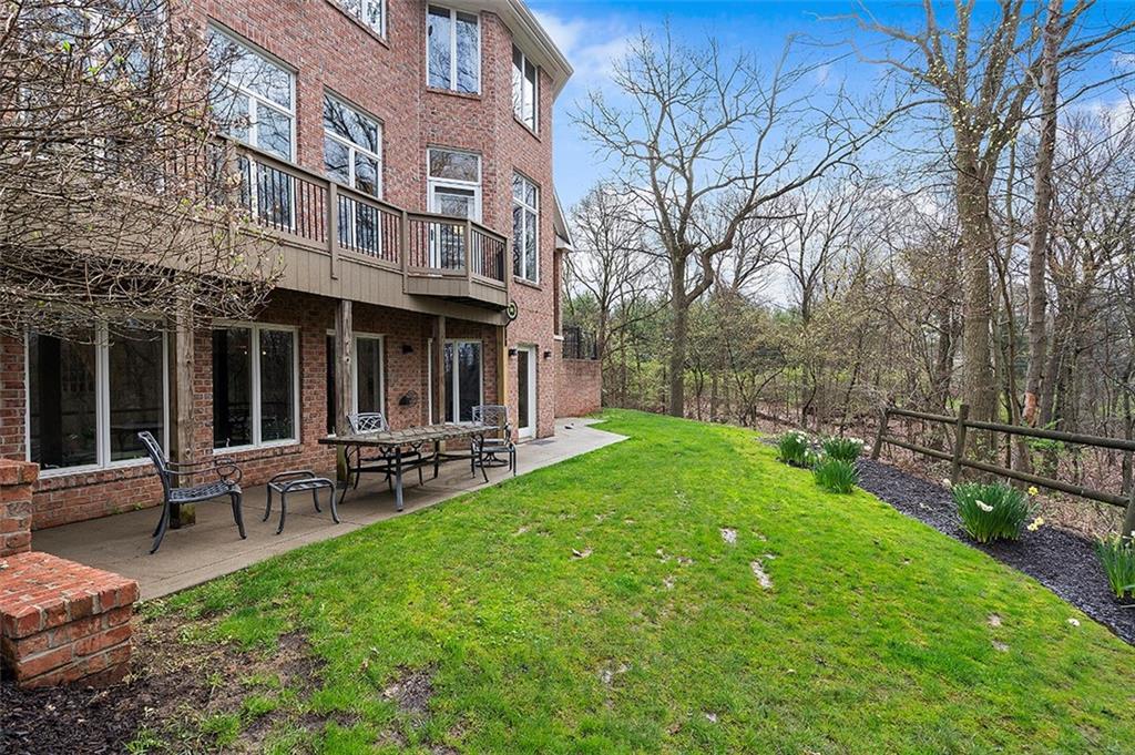 198 Camp Meeting Rd Extension Sewickley, PA 15143 - Photo 47 of 50 a view of a building with a yard patio and fire pit