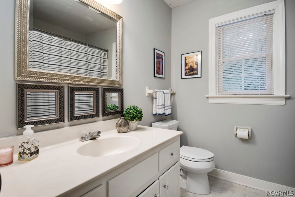 13805 Sterlings Bridge Road Midlothian, VA 23112 - Photo 15 of 24 a bathroom with a sink and a toilet