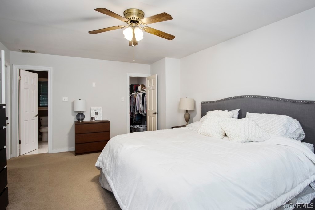 13805 Sterlings Bridge Road Midlothian, VA 23112 - Photo 18 of 24 a bedroom with a bed and a chandelier