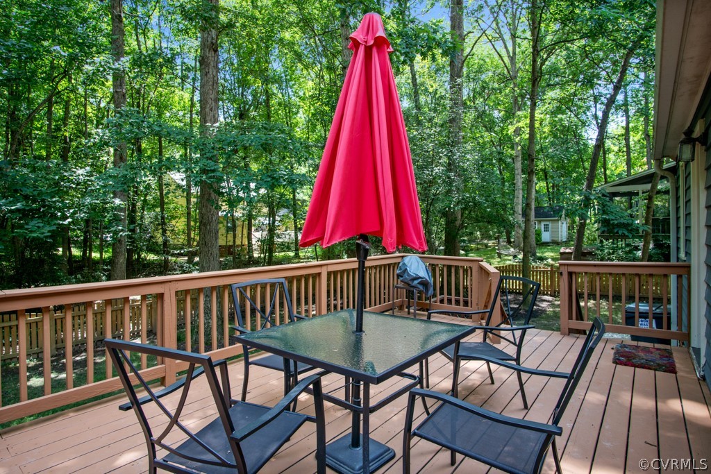 13805 Sterlings Bridge Road Midlothian, VA 23112 - Photo 21 of 24 a view of a chair and table in the deck