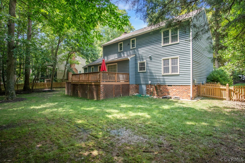 13805 Sterlings Bridge Road Midlothian, VA 23112 - Photo 23 of 24 a view of a house with backyard and a tree