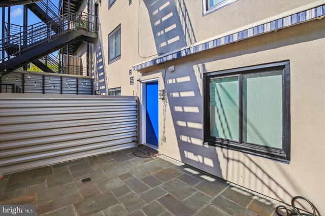 a view of a house with a door and chair