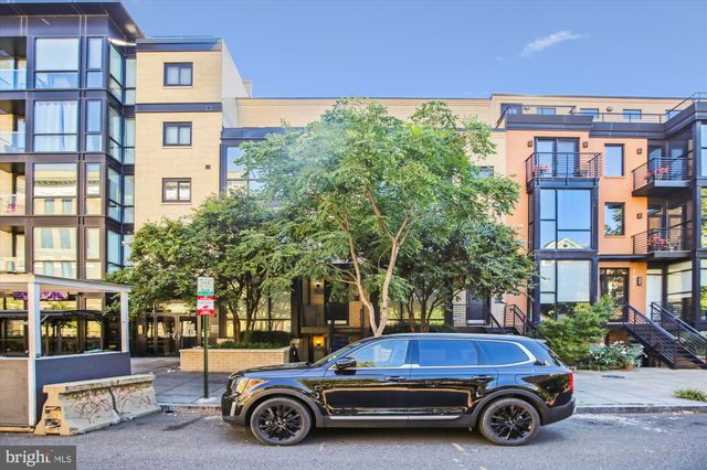 a car parked in front of a building