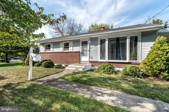 front view of house with a yard
