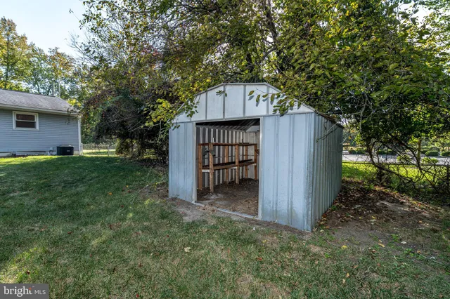 a house view with a backyard space