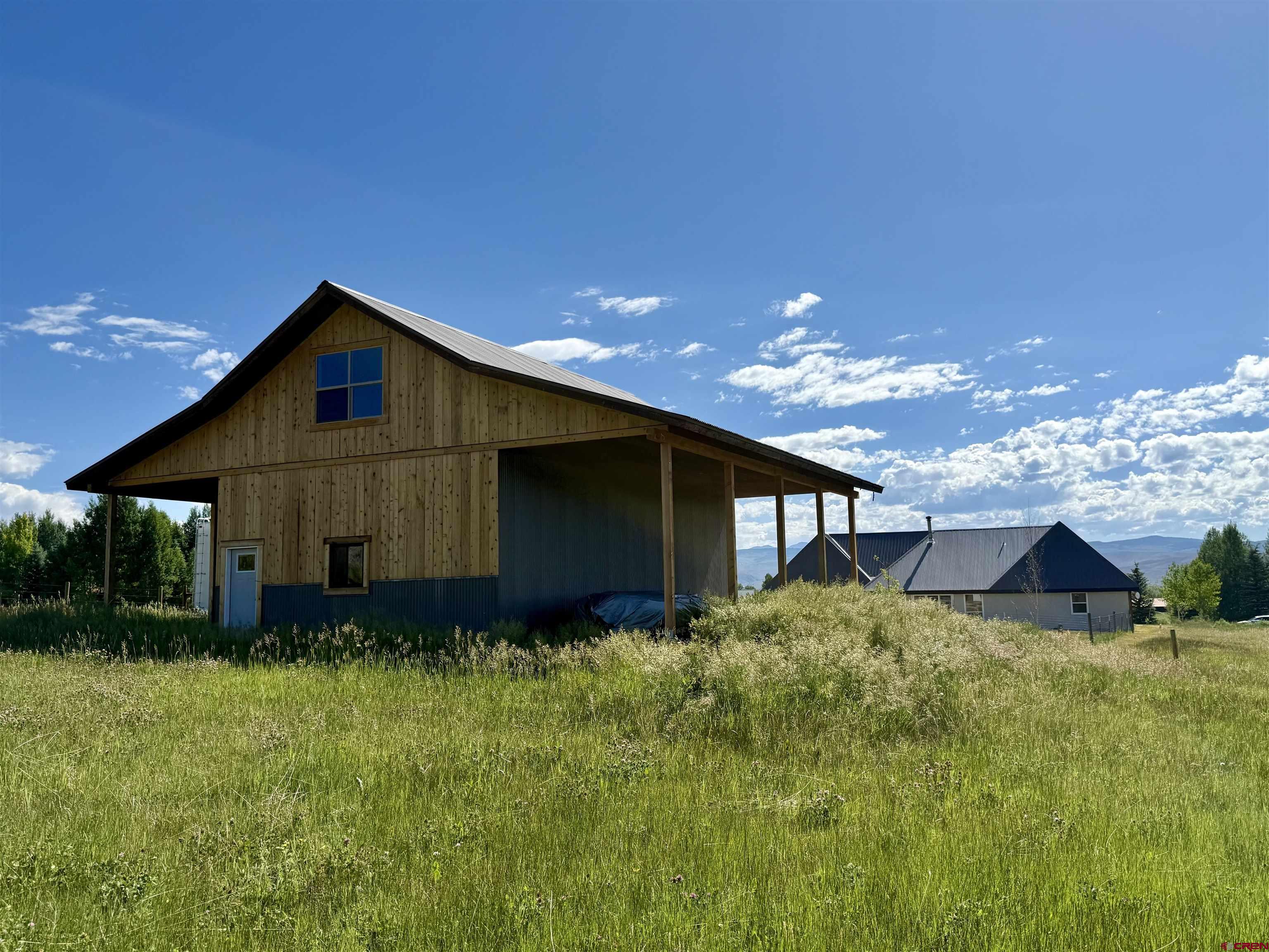 577 Pashuta Drive Gunnison, CO 81230 - Photo 30 of 41 a house view with a garden space
